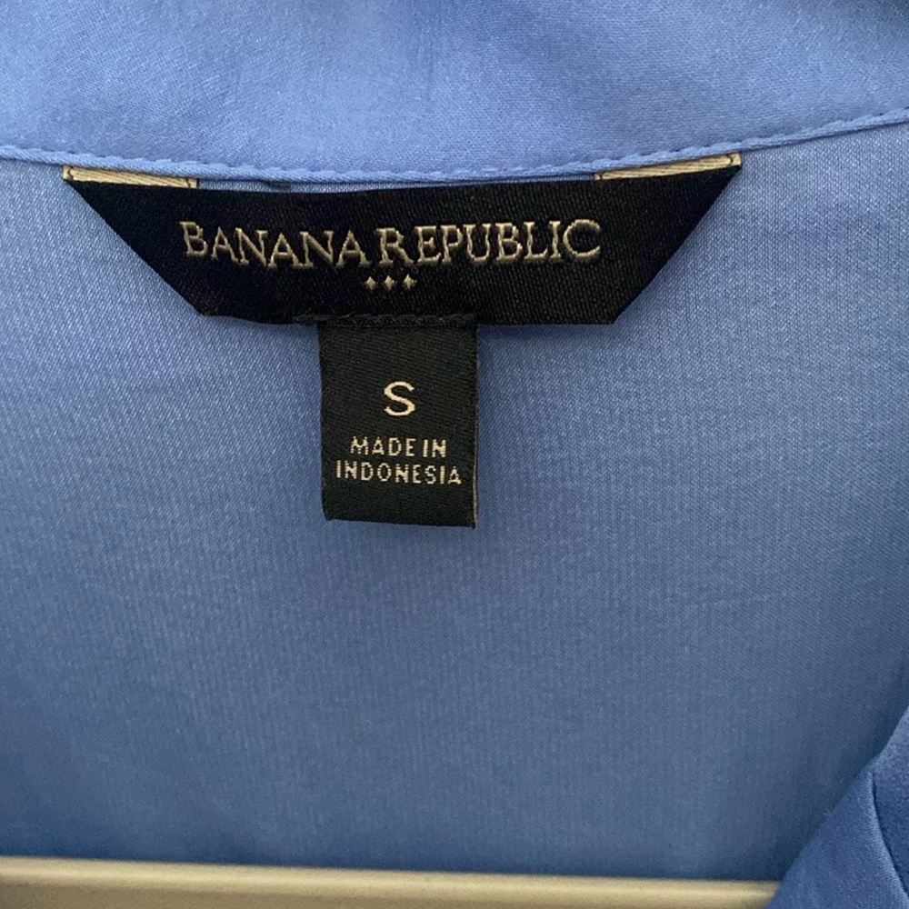 Blue blouse —never been worn. Excellent condition.